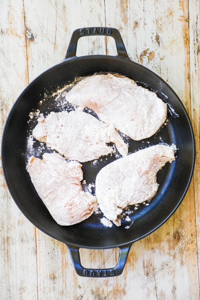How to make Creamy Chicken Piccata step 1: Coat the chicken breast in flour and lightly fry on both sides.