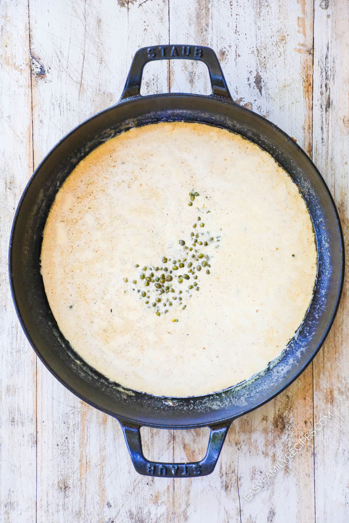 How to make Creamy Chicken Piccata step 2: Make the lemon cream sauce with the pan drippings.