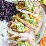 Easy Carnitas street tacos served with rice and beans.