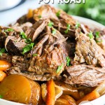 Bowl with cooked pot roast, potatoes, and carrots