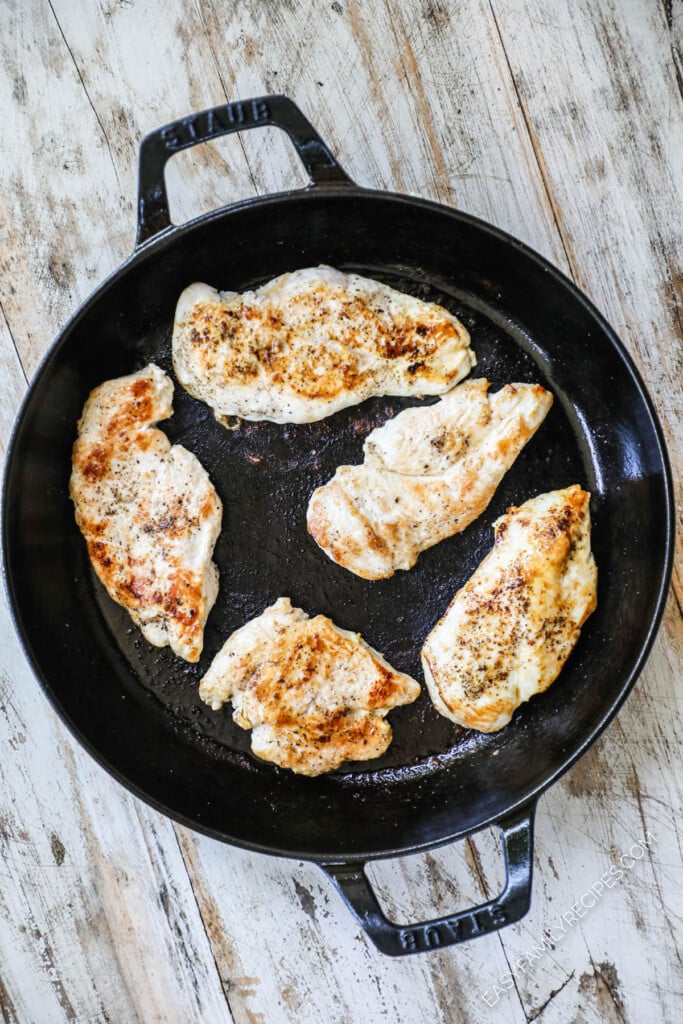 How to Make Sun Dried Tomato Basil Chicken Step 2: Sear chicken on both sides in skillet.