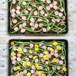 Steps to make cajun sheet pan sausage and veggies step 1. chop sausage and spread out on pan step2. add chopped green beans to pan step 3. add diced potatoes to pan and butter step4. bake and enjoy!