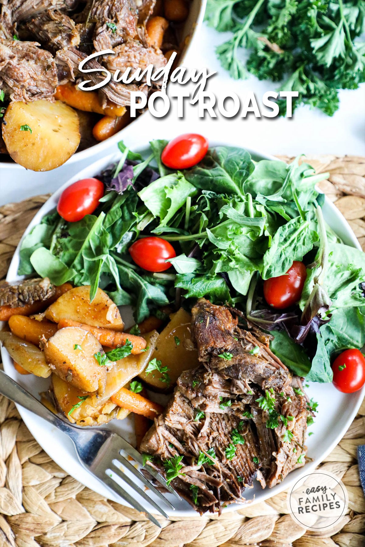 A beef pot roast dinner with potatoes, carrots, and a green salad