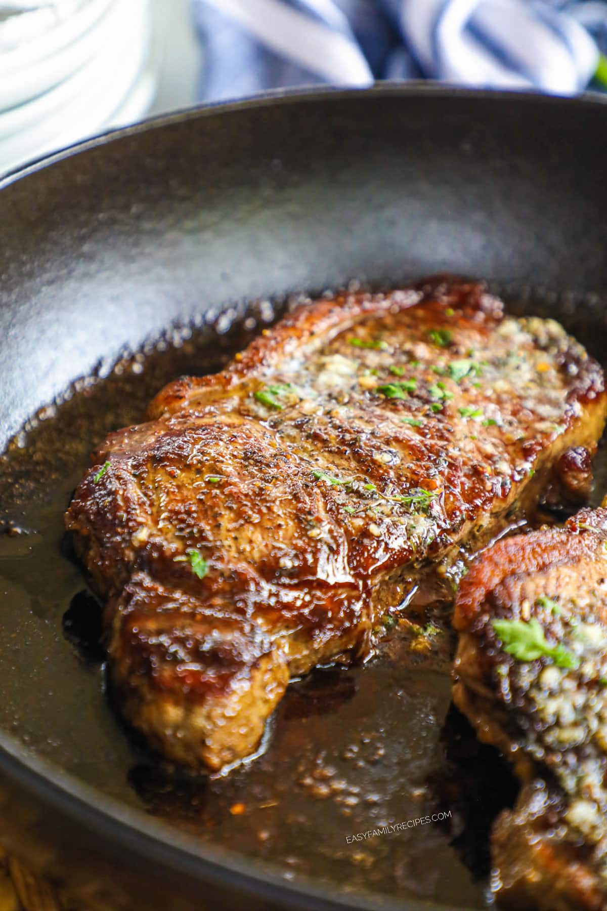 Seared steak in a hot skillet