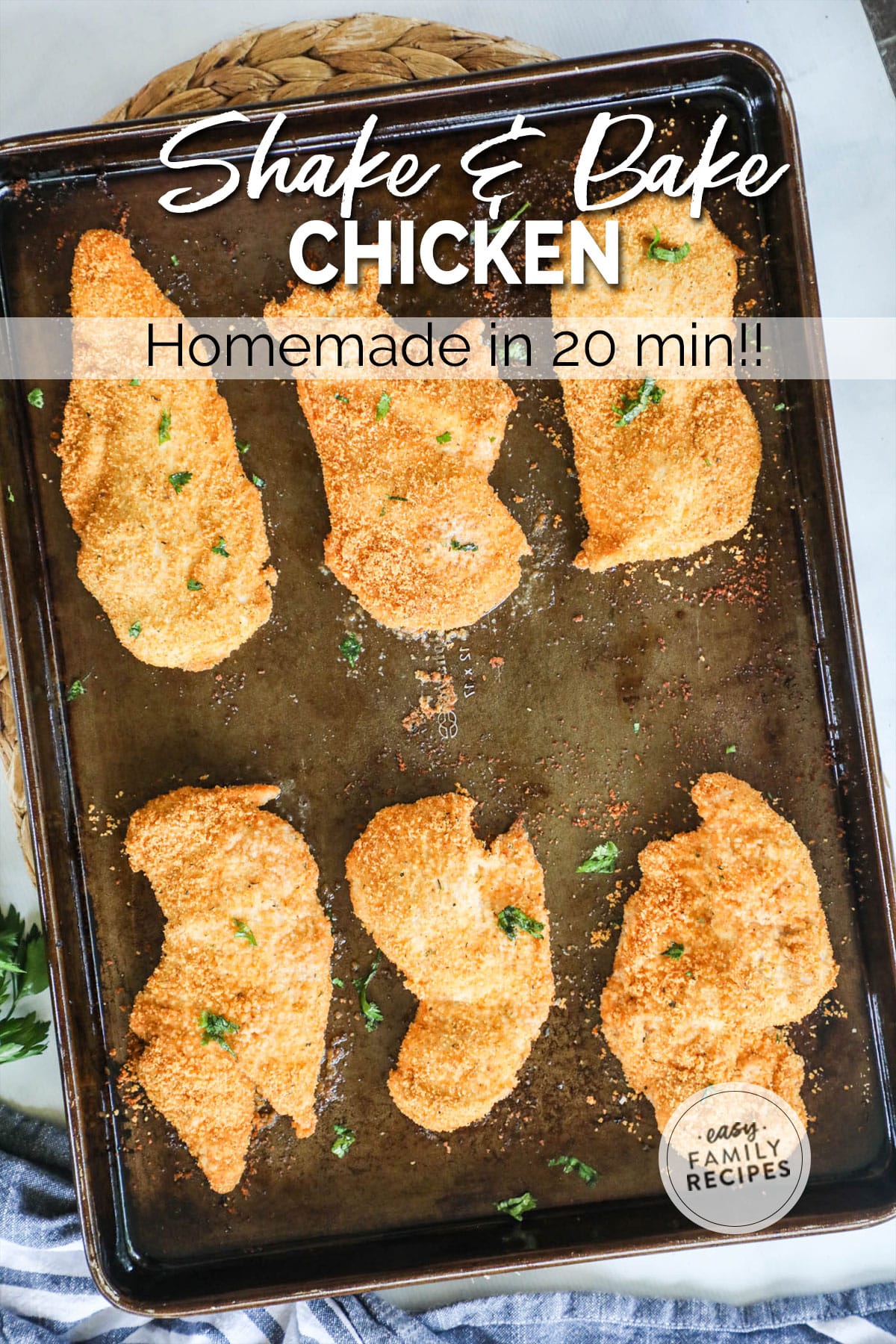 breaded chicken cutlets baked to golden brown on a cookie sheet.