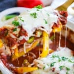Baked Italian Chicken and Peppers being scooped out with a spoon