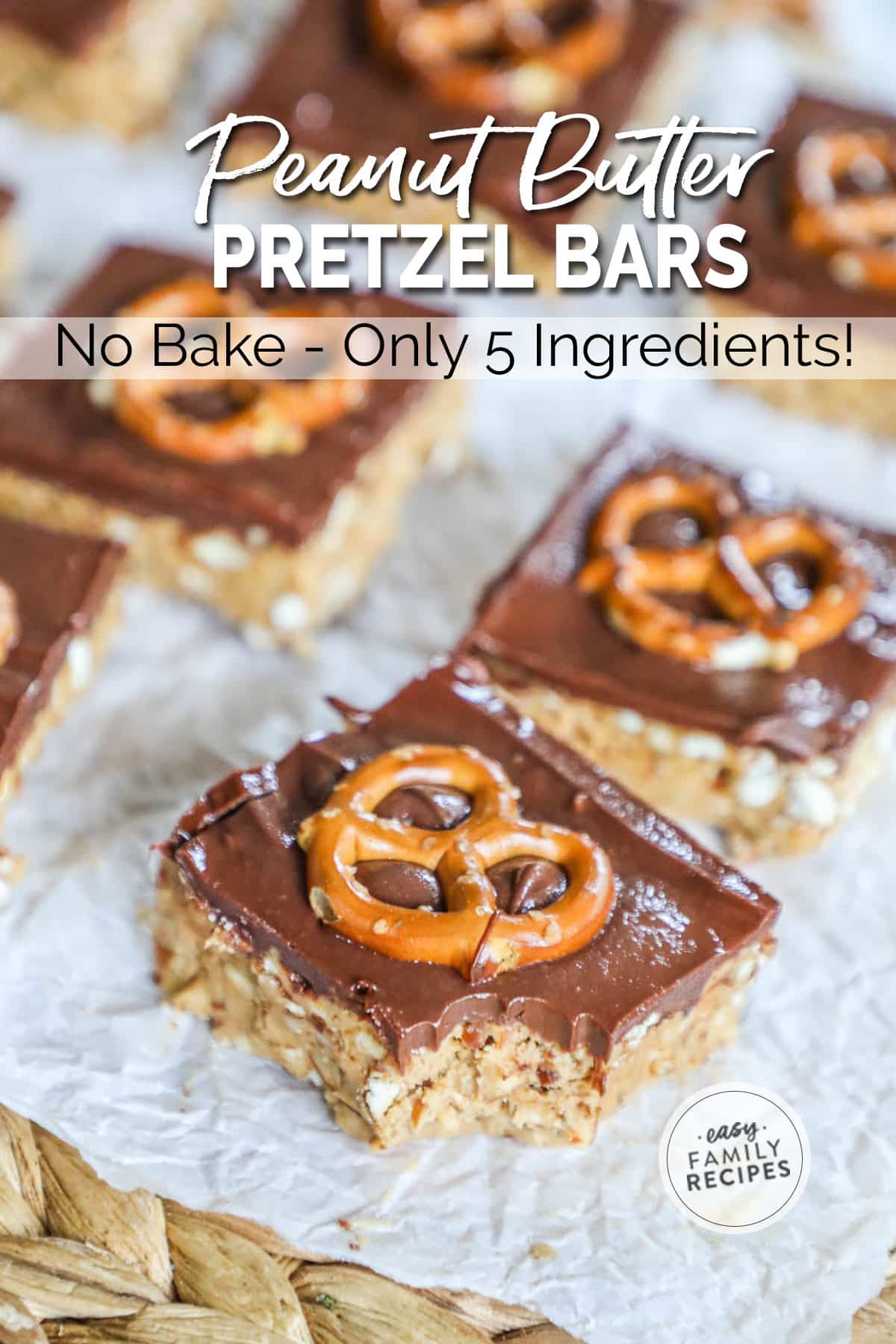 Peanut butter pretzel chocolate bars with a single pretzel twist on the top of each square.