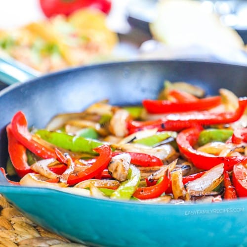 Sauteed peppers and onions in a cast iron skillet