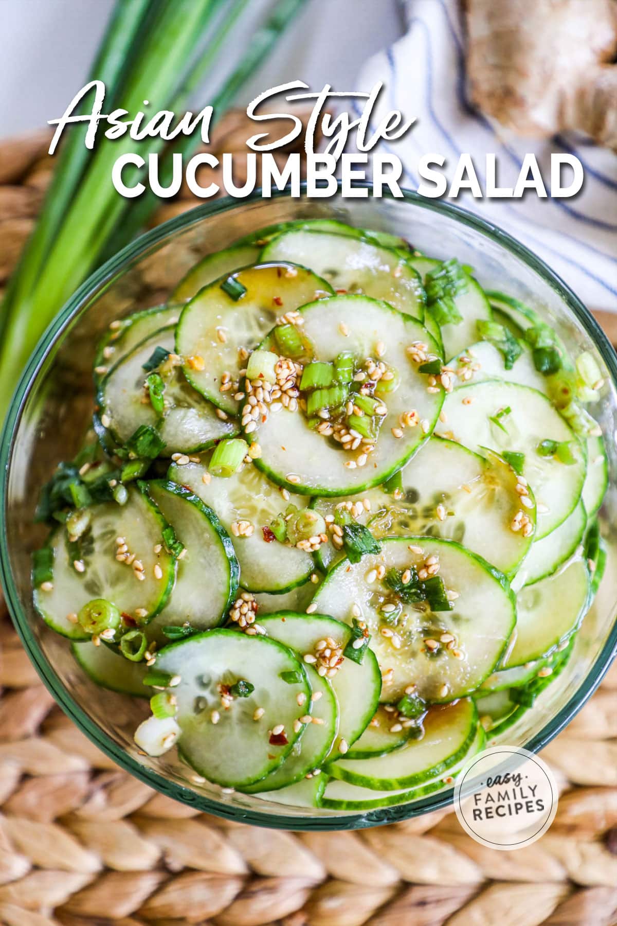 Asian cucumber salad with sesame seeds in a jar.