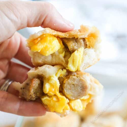 Biscuits stuffed with sausage egg and cheese to make a breakfast bomb.