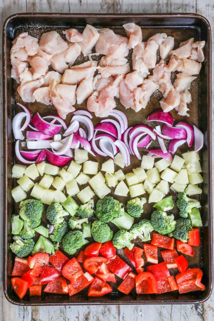 How to make Sheet Pan Pineapple Chicken step 1: place everything on a sheet pan.