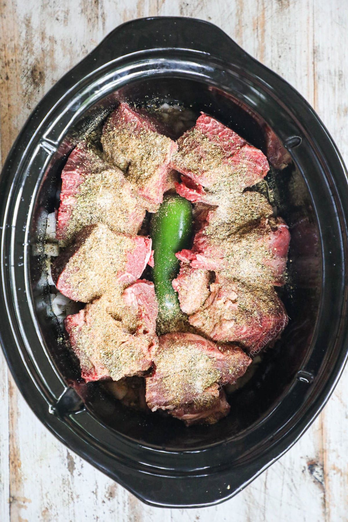 How to make Beef Barbacoa Step 3 - add the rest of the seasonings to the top
