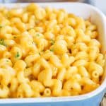 Close up image of baked mac and cheese in a baking dish.