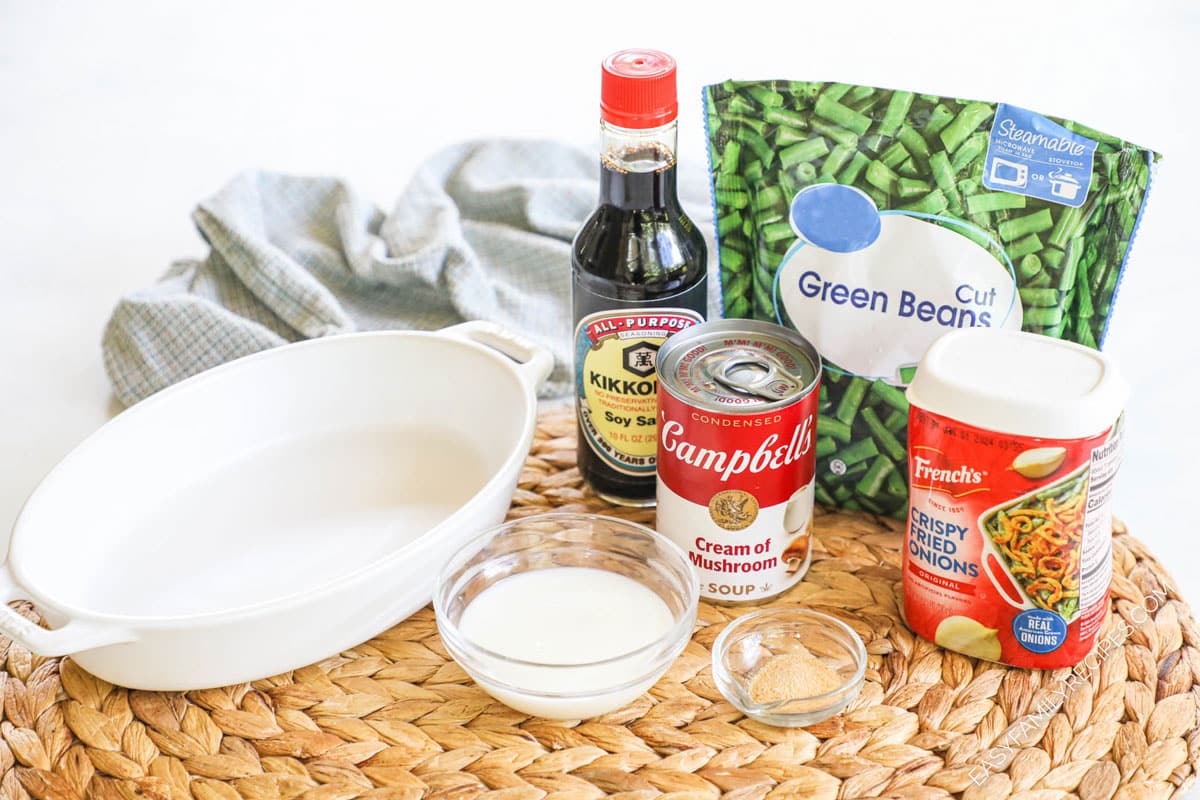 ingredients to make green bean casserole including mushroom soup, french fried onions, and soy sauce.