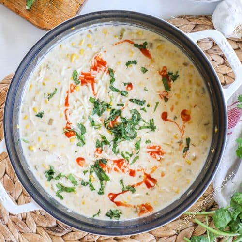 overhead of a pot full of green chili chicken corn chowder