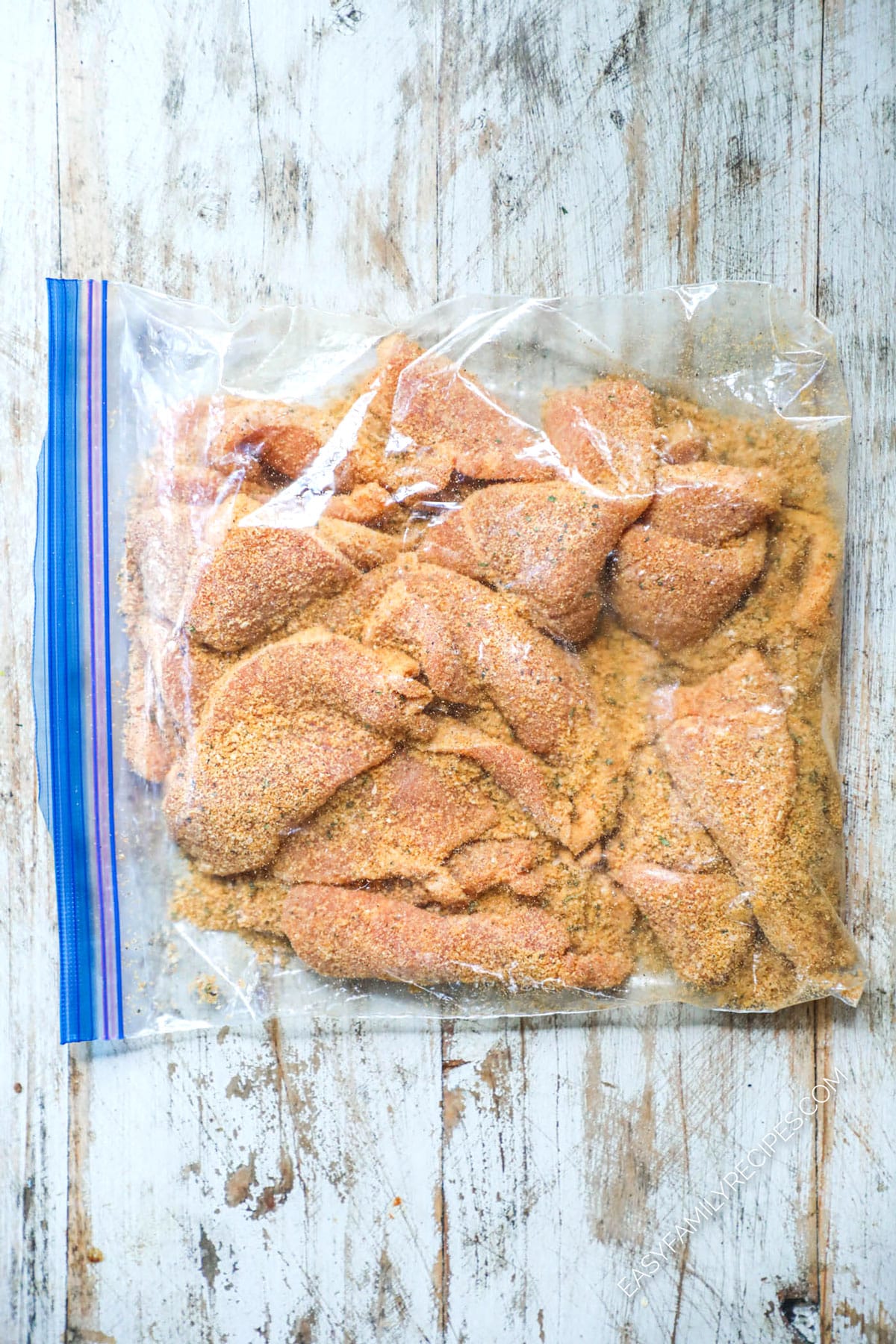 How to make Homemade Shake and Bake Pork Chops Step 3: Add the pork chops to the homemade shake and bake and shake to coat.