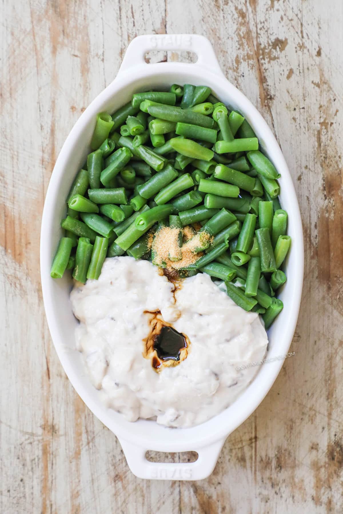 Step 1 for green bean casserole dish - add all ingredients to a dish