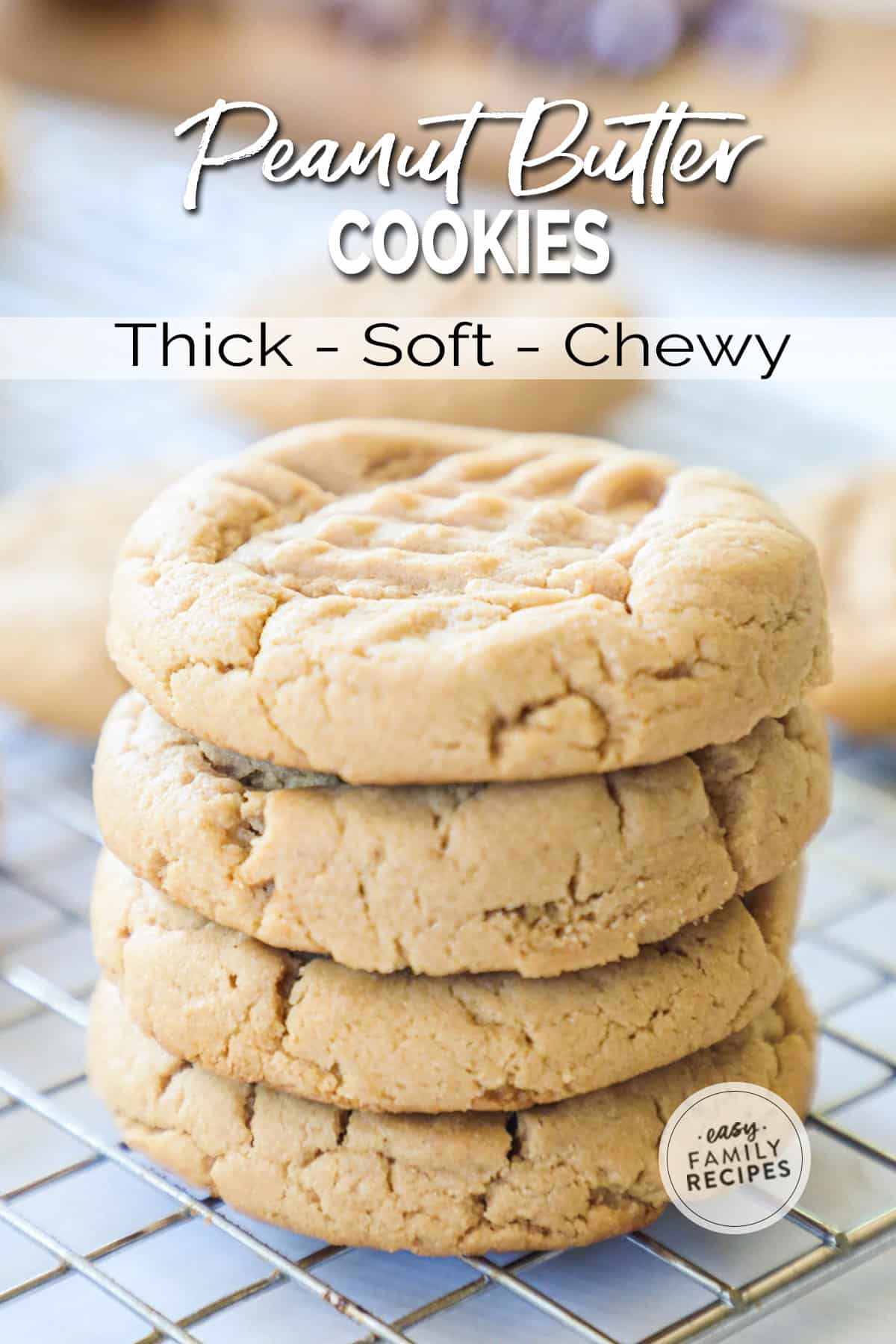 Stack of 4 peanut butter cookies on a wire cooling rack with more cookies nearby.