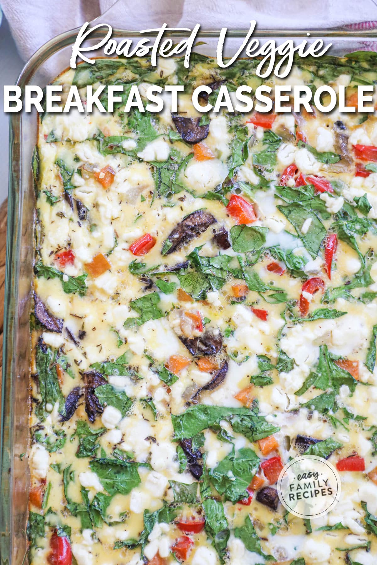 Overhead image of the breakfast veggie casserole with red bell peppers, green spinach, and sweet potatoes.