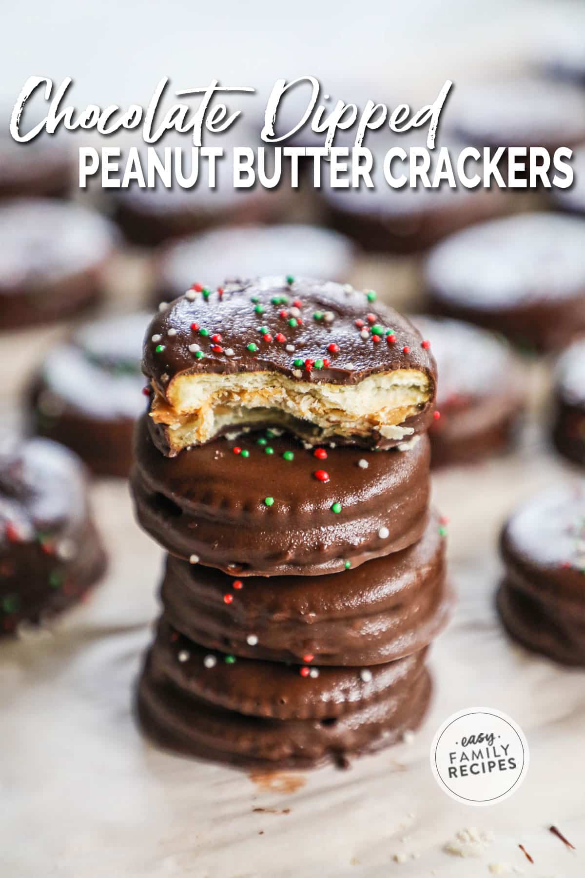 A stack of chocolate peanut butter ritz crackers with red, white, and green sprinkles.