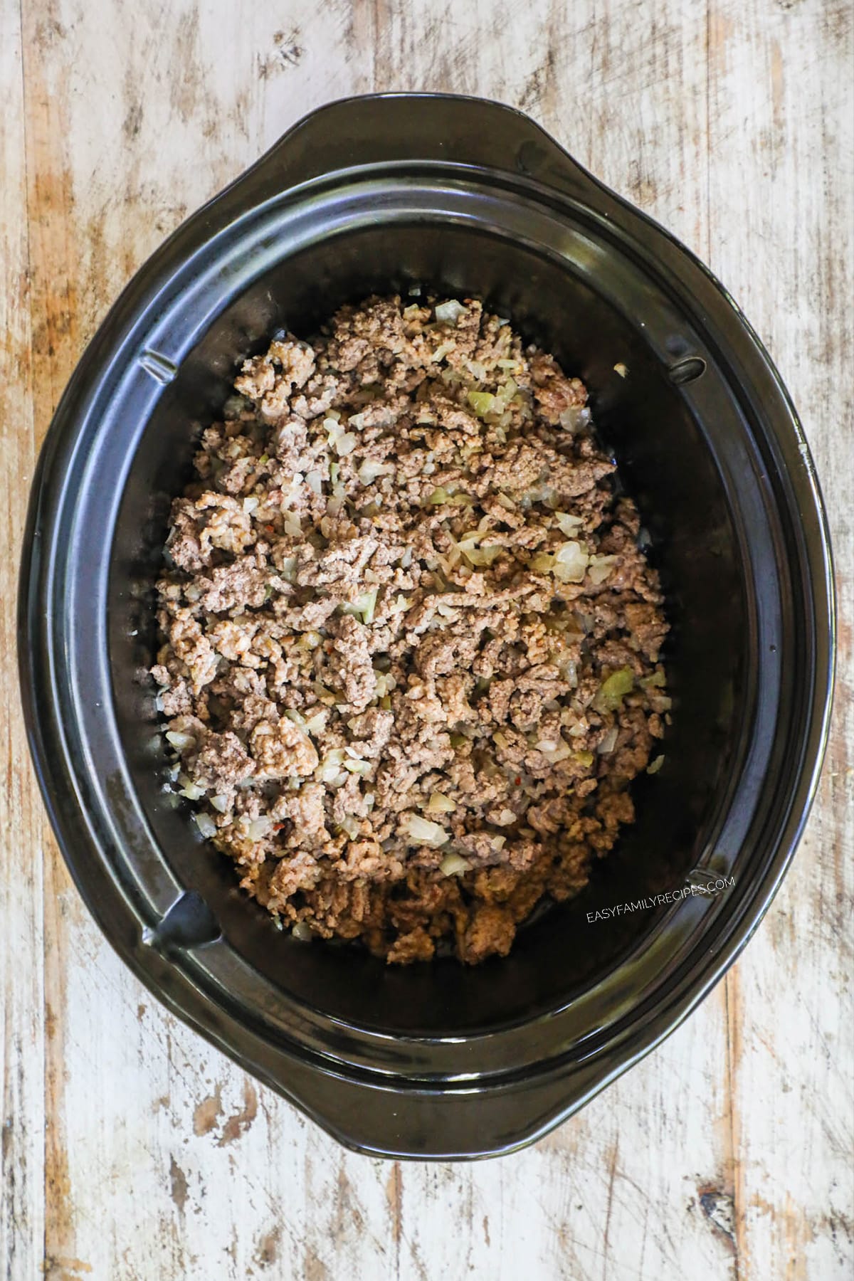 Step 1 - GRound beef cooked in a slow cooker