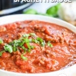 marinara sauce in a large white bowl and garnished with basil