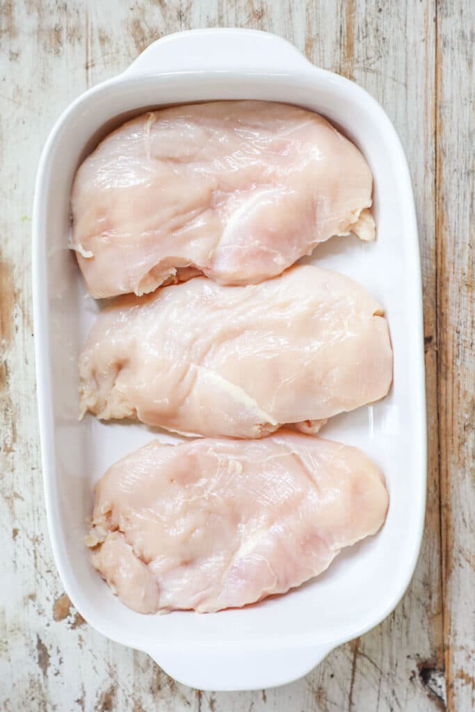 Step 1 of Baked Chicken Breast recipe - chicken in a dish