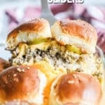 Cheeseburger Sliders on Hawaiian Rolls being lifted from the Pan