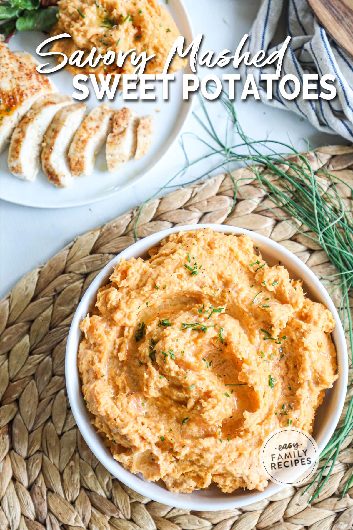 overhead of a white bowl filled with mashed sweet potatoes.