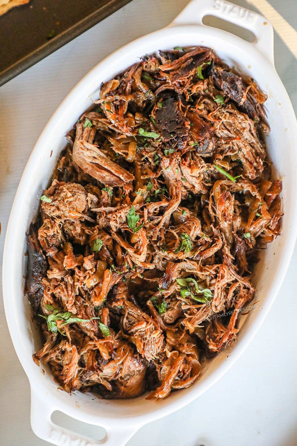 French Onion Pot Roast garnished with parsley.