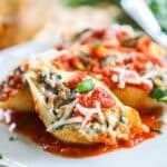 pasta shells stuffed with meat and topped with marinara and mozzarella cheese.