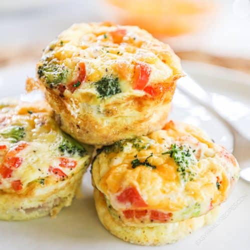 3 Ham and Cheese Egg Muffins baked and ready to eat on a plate