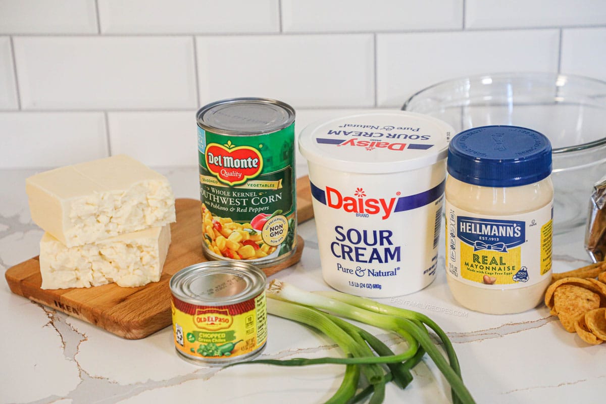 cheesy corn dip ingredients on the counter.