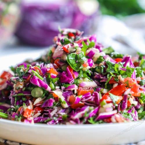 Plateful of spring chopped salad with pomegranate dressing.