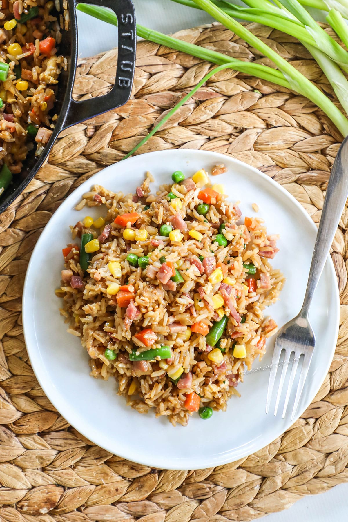 Ham fried rice recipe prepared and served on a plate for dinner.