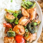 Top view of Easy Chicken Stir Fry on a plate with rice.