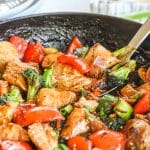 Chicken and vegetable stir fry in skillet