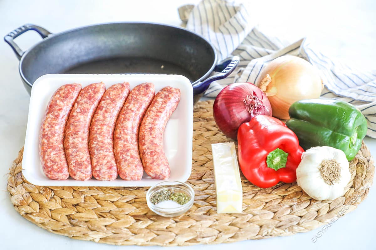 Ingredients for Old-Fashioned Italian Sausage and Peppers, including sausage, butter, vegetables, and seasoning