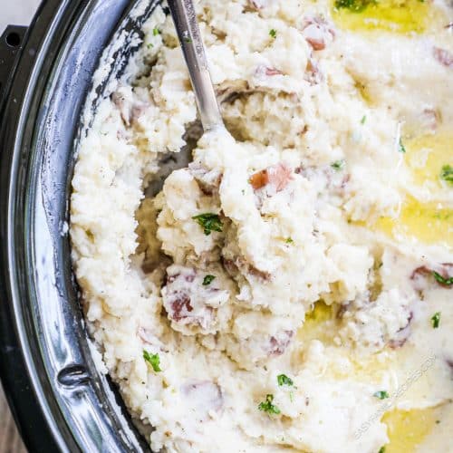 closeup of slow cooker mashed potatoes in a crockpot.