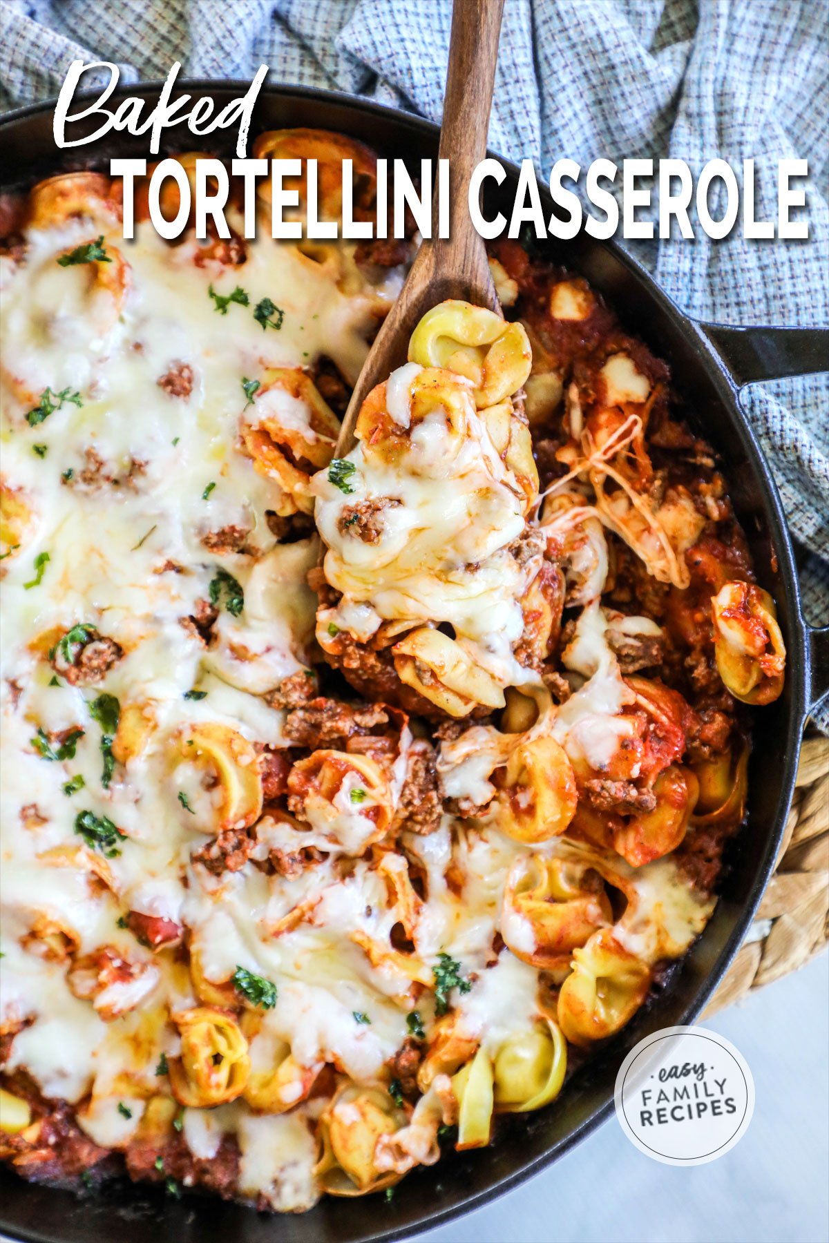 Overhead view of baked tortellini casserole in skillet