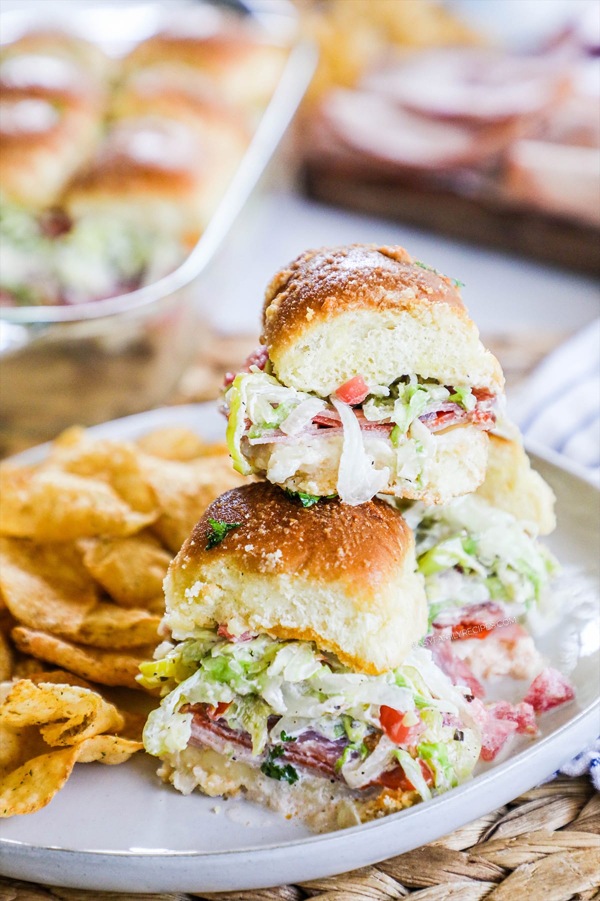 Italian Grinder Sliders stuffed with cold cuts and salad.