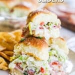 Italian Grinder Sliders piled on a plate ready to eat.