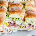 Italian Grinder Sliders on Hawaiian Rolls packed with cold cuts and salad.