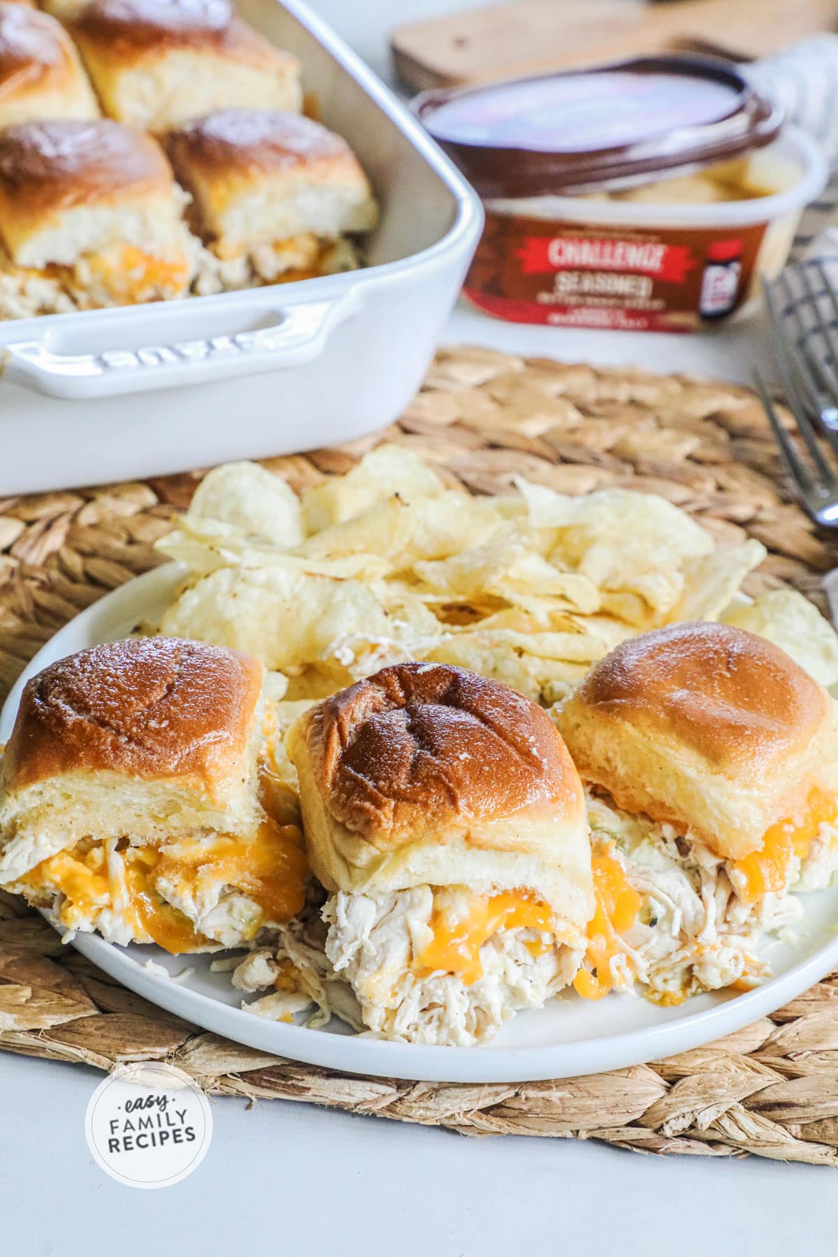 3 Jalapeno Chicken Sliders on a plate served with chips