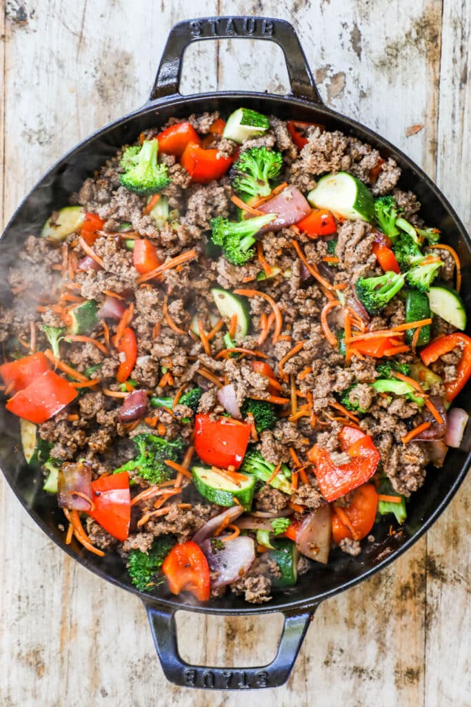 How to make ground beef stir fry step 3: add the vegetables and cook until soft.