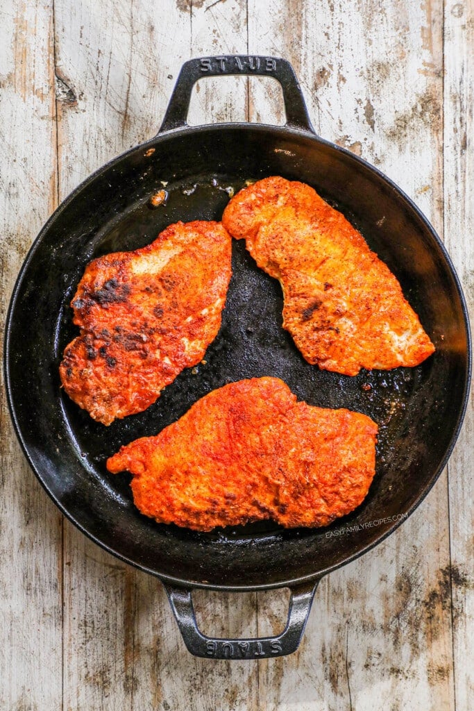 How to make Hot Honey Chicken Breast Step 4: Pan fry the chicken breast until cooked through.