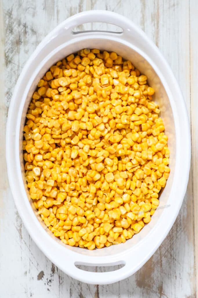 How to make Mexican Street Corn Casserole Step 1: Put corn in casserole dish.