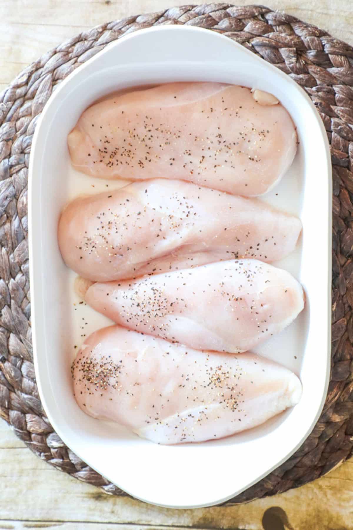 Step by Step recipe for Bruschetta Chicken Step 1: put chicken in a casserole dish and season with salt and pepper