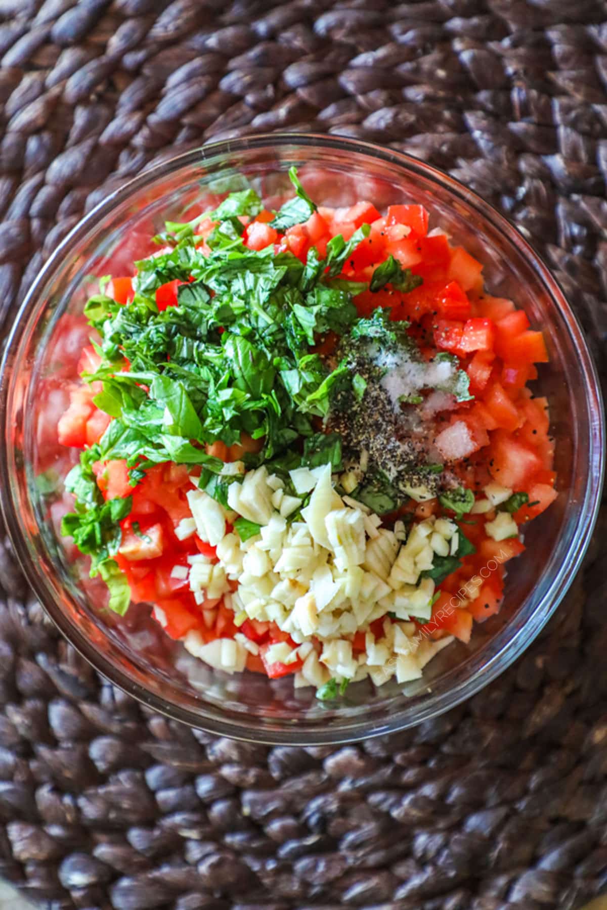 Step by Step recipe for Bruschetta Chicken Step 2. Chop ingredients and add to a large bowl and toss together