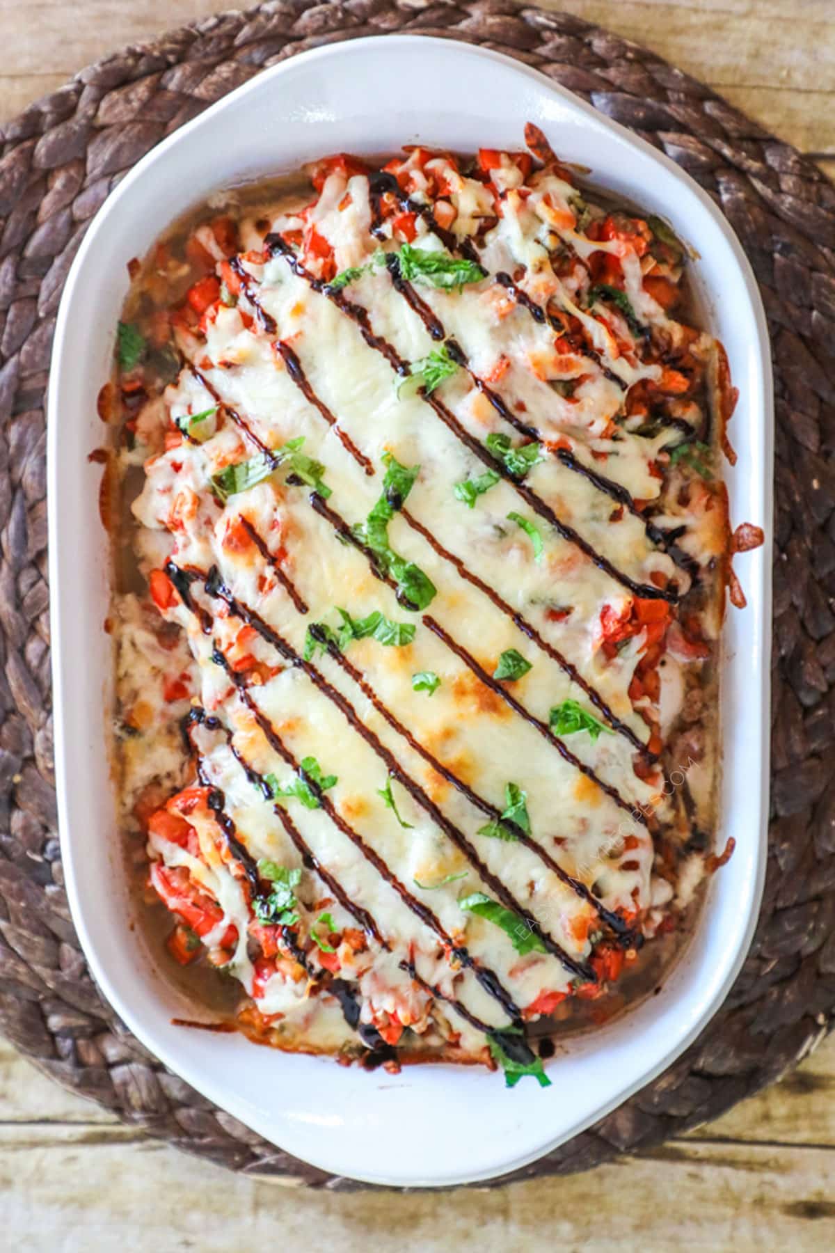 Step by Step recipe for Bruschetta Chicken Step 4. Top chicken with nozzarella and bake